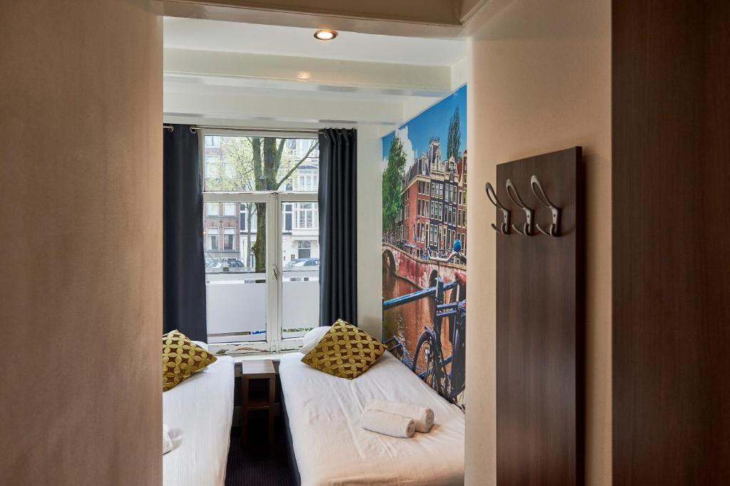 Двухместный (Двухместный номер с 1 кроватью или 2 отдельными кроватями и общей ванной комнатой, основные удобства) отеля ITC Hotel, Амстердам