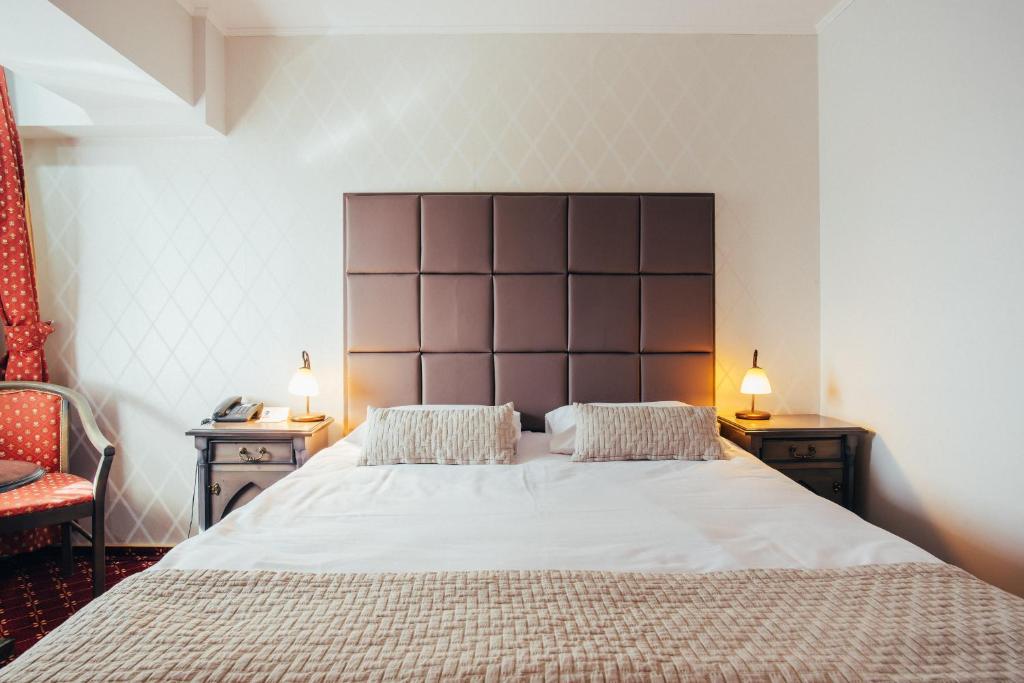 Двухместный (Улучшенный двухместный номер с 1 кроватью или 2 отдельными кроватями и балконом) отеля Best Western Bucovina Club de Munte, Гура-Гуморулуй