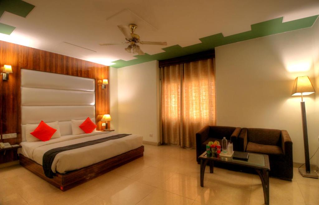 Двухместный (Бюджетный двухместный номер с 1 кроватью или 2 отдельными кроватями) отеля Airport Hotel Impress, Нью-Дели