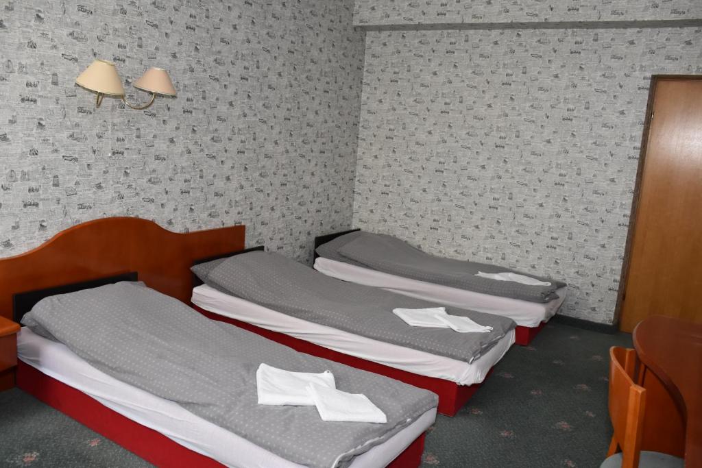 Трехместный (Трехместный номер с собственной ванной комнатой) апарт-отеля Montemarco, Варшава