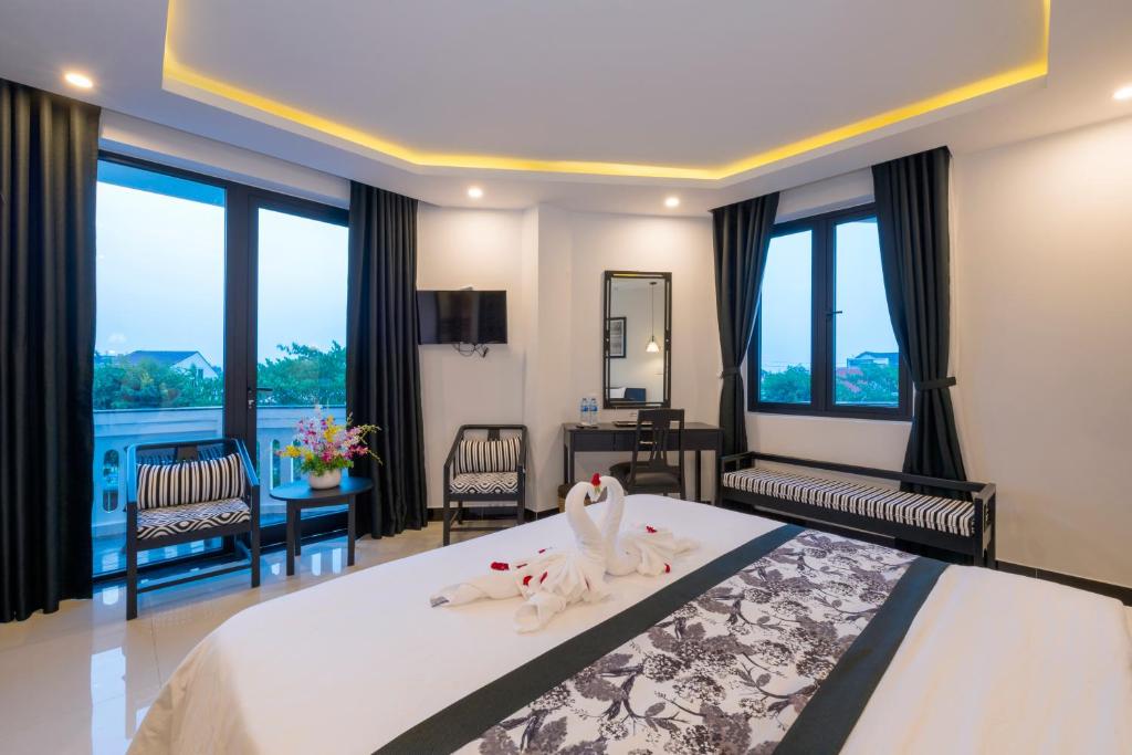 Двухместный (Двухместный номер Делюкс с 1 кроватью и балконом) отеля Hoianation Villas Hotel, Хойан