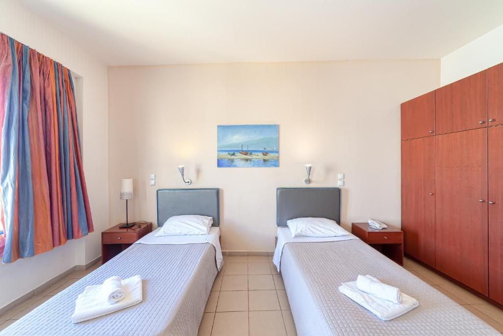 Апартаменты (Апартаменты с 1 спальней и видом на сад (для 2-4 взрослых)) апарт-отеля Olympic Suites, Ретимно, Крит
