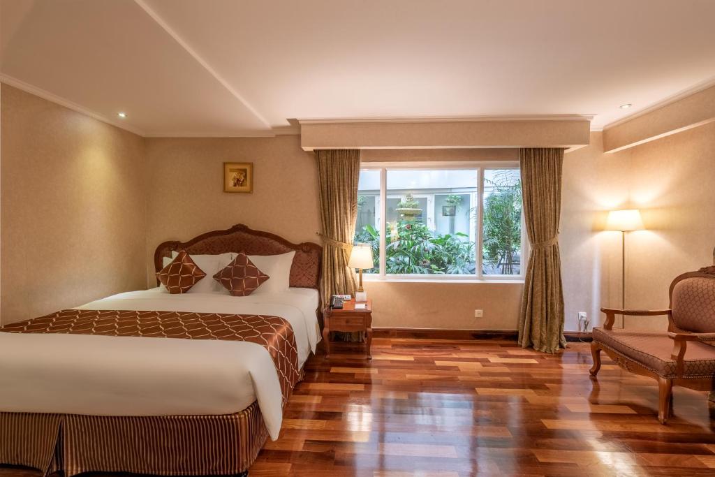Двухместный (Номер «Премиум» Делюкс с кроватью размера «king-size») отеля Grand Hotel Saigon, Хошимин