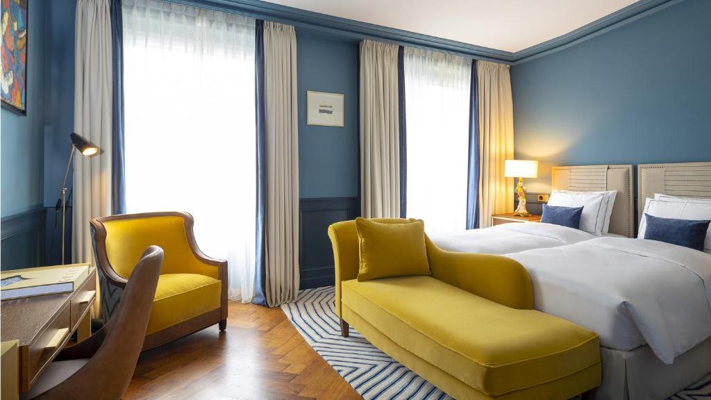 Двухместный (Улучшенный двухместный номер с 2 отдельными кроватями и ванной) отеля Hôtel Longemalle, Женева