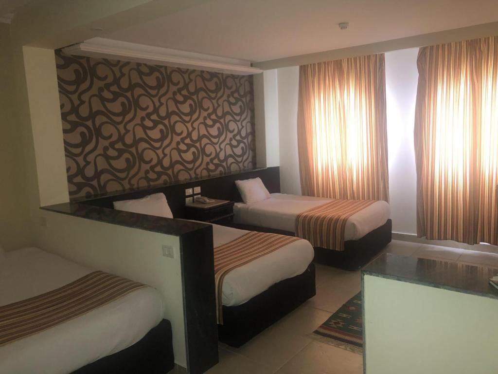 Трехместный (Стандартный трехместный номер) курортного отеля Panorama Bungalows Resort El Gouna, Хургада