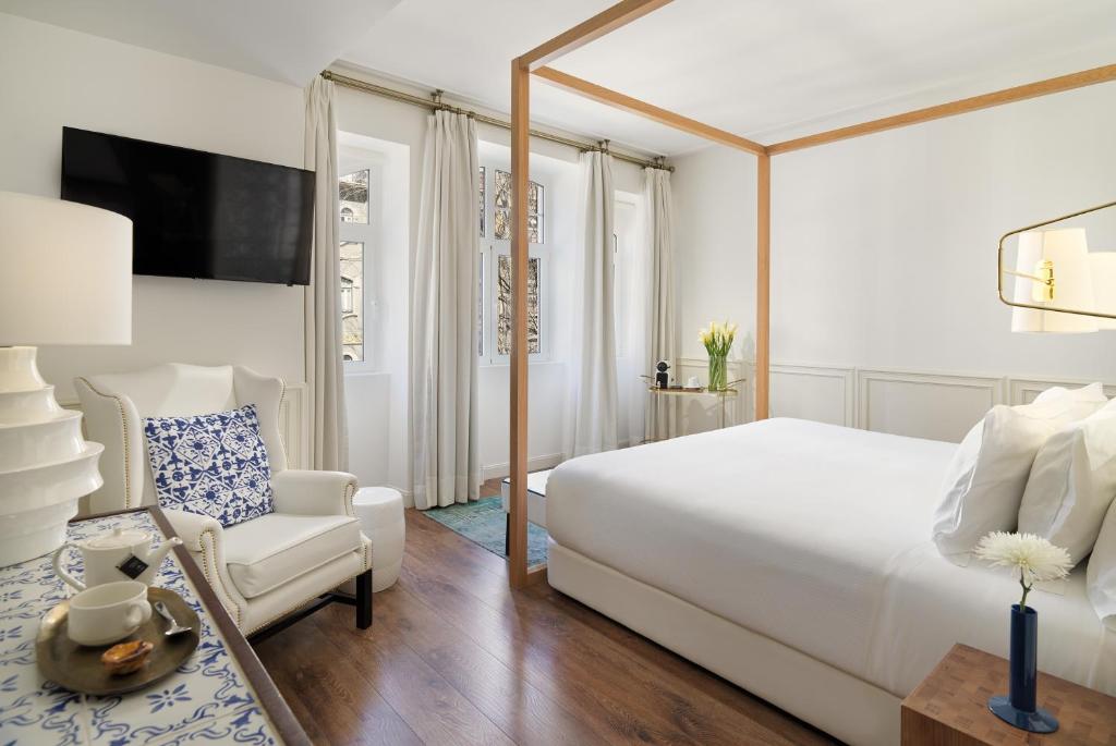 Двухместный (Улучшенный двухместный номер с 1 кроватью или 2 отдельными кроватями) отеля H10 Duque de Loule, Лиссабон