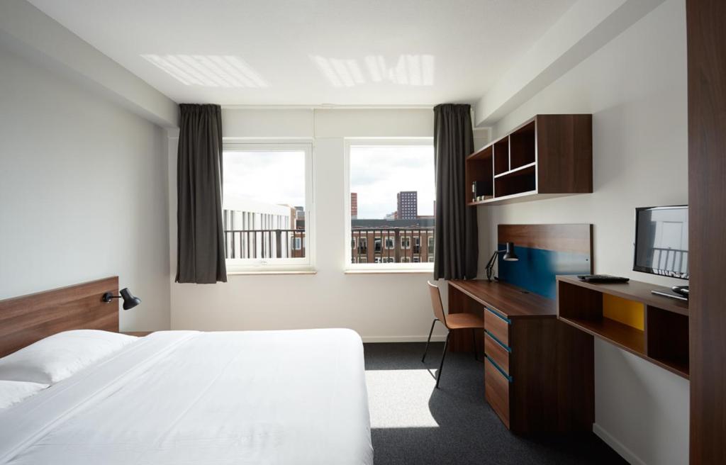 Двухместный (Представительский номер с кроватью размера «queen-size») отеля The Student Hotel The Hague, Гаага