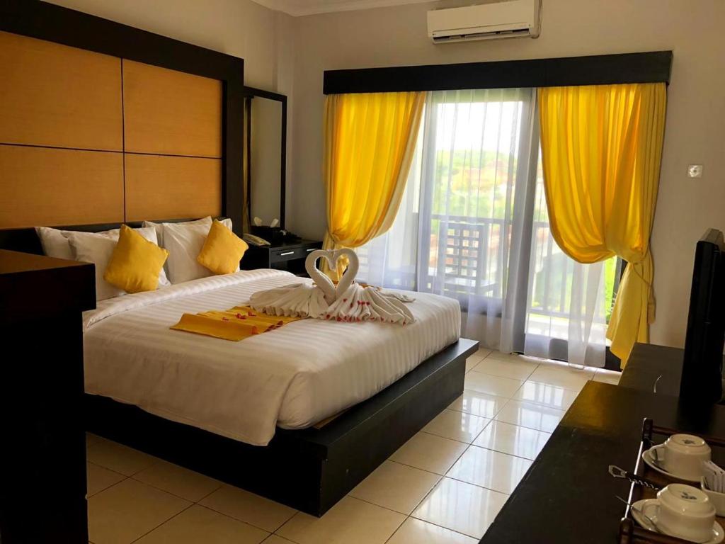 Двухместный (Двухместный номер «Премиум» с 1 кроватью или 2 отдельными кроватями) отеля Mamo Hotel Uluwatu, Улувату