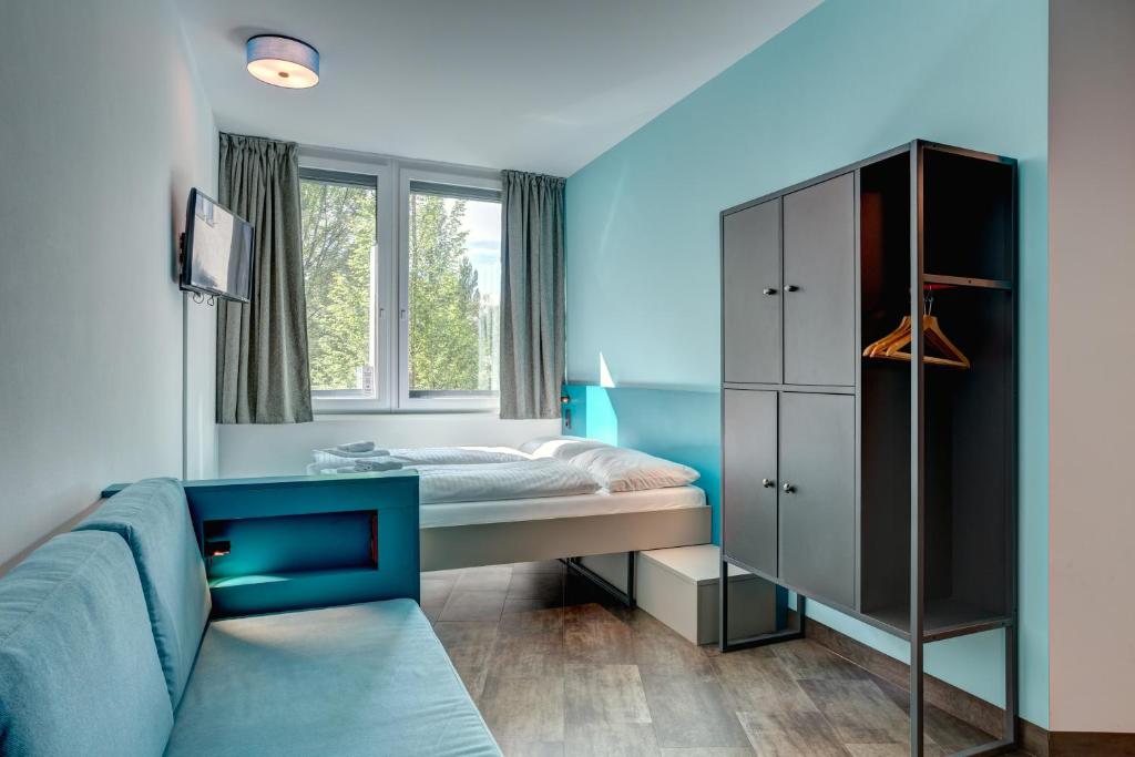 Семейный (Пятиместный номер) отеля MEININGER Hotel München Olympiapark, Мюнхен