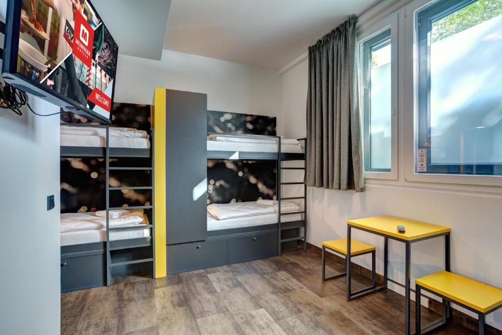 Номер (Кровать в общем 6-местном номере для мужчин и женщин) отеля MEININGER Hotel München Olympiapark, Мюнхен
