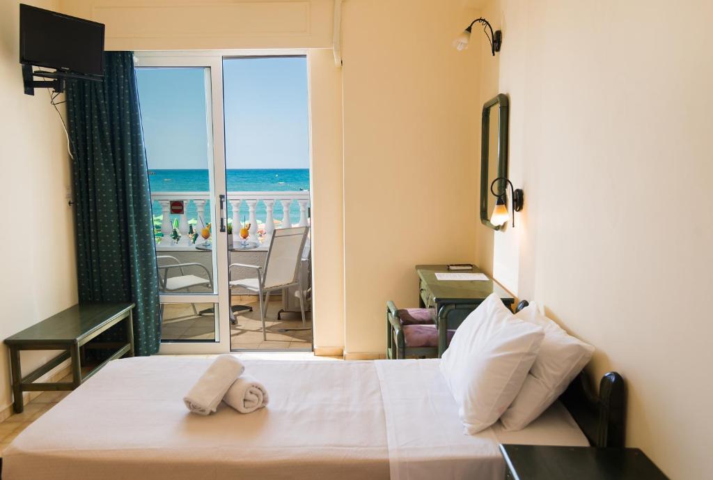 Двухместный (Двухместный номер Делюкс с 1 кроватью или 2 отдельными кроватями и видом на море) отеля Birais Beach Studios, Ретимно, Крит