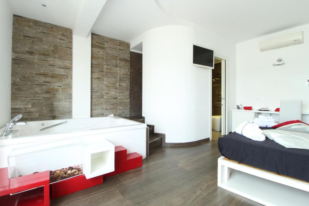 Двухместный (Двухместный номер Делюкс с 1 кроватью и гидромассажной ванной) отеля Caos Calmo, Рим