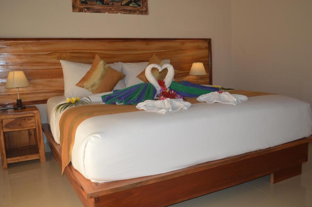 Двухместный (Улучшенный двухместный номер с 1 кроватью и террасой) парк-отеля Penida Bay Village, Нуса Пенида