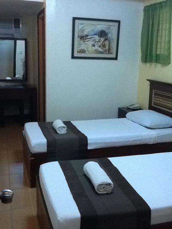 Двухместный (Стандартный двухместный номер с 2 отдельными кроватями) отеля Darunday Manor, Панглао