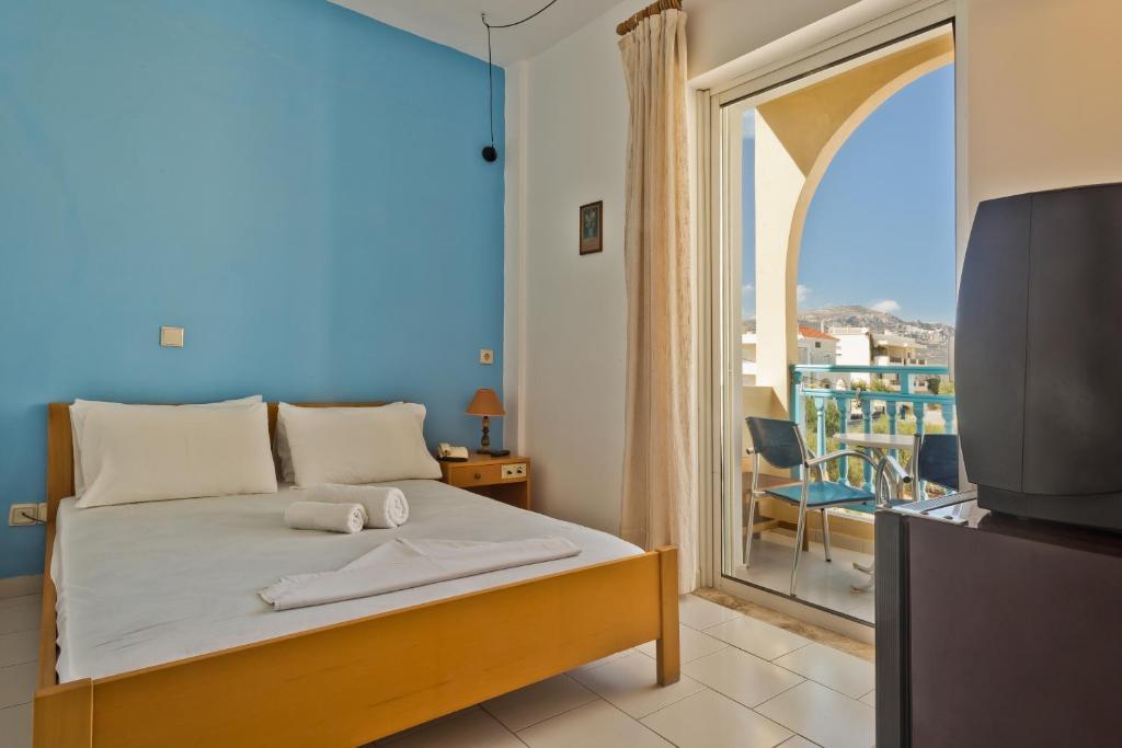 Двухместный (Двухместный номер с 2 отдельными кроватями) отеля Olympic Hotel, Карпатос