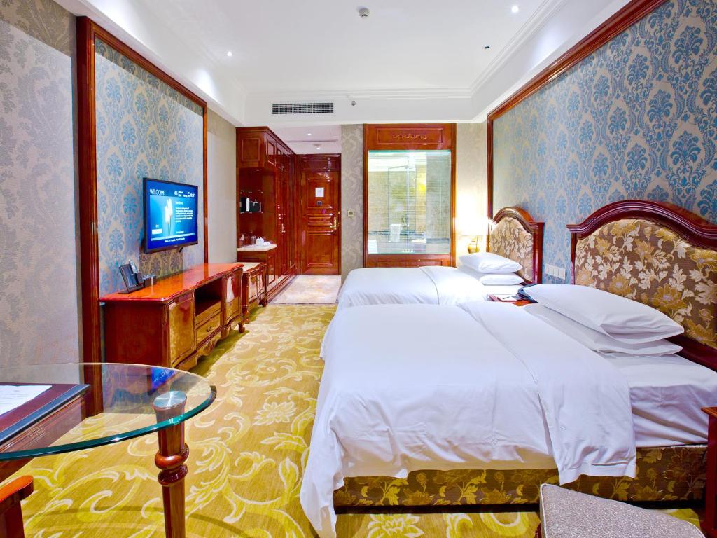Двухместный (Представительский двухместный номер с 2 отдельными кроватями) отеля Huachen International Hotel, Чунцин