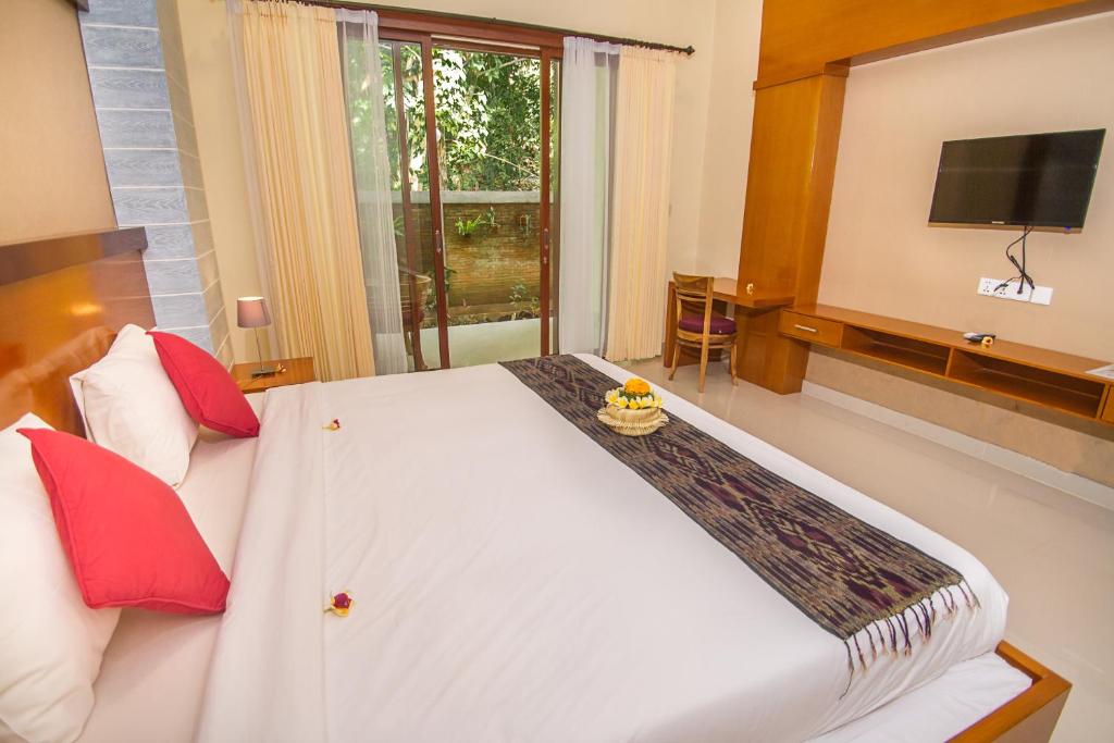 Двухместный (Номер Делюкс с видом на сад и бесплатным бонусом) гостевого дома Adi Jaya Cottages Jungle Suites by EPS, Убуд