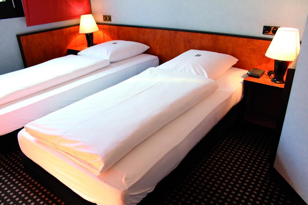 Двухместный (Двухместный номер с 2 отдельными кроватями) отеля Ara Hotel Comfort, Ингольштадт