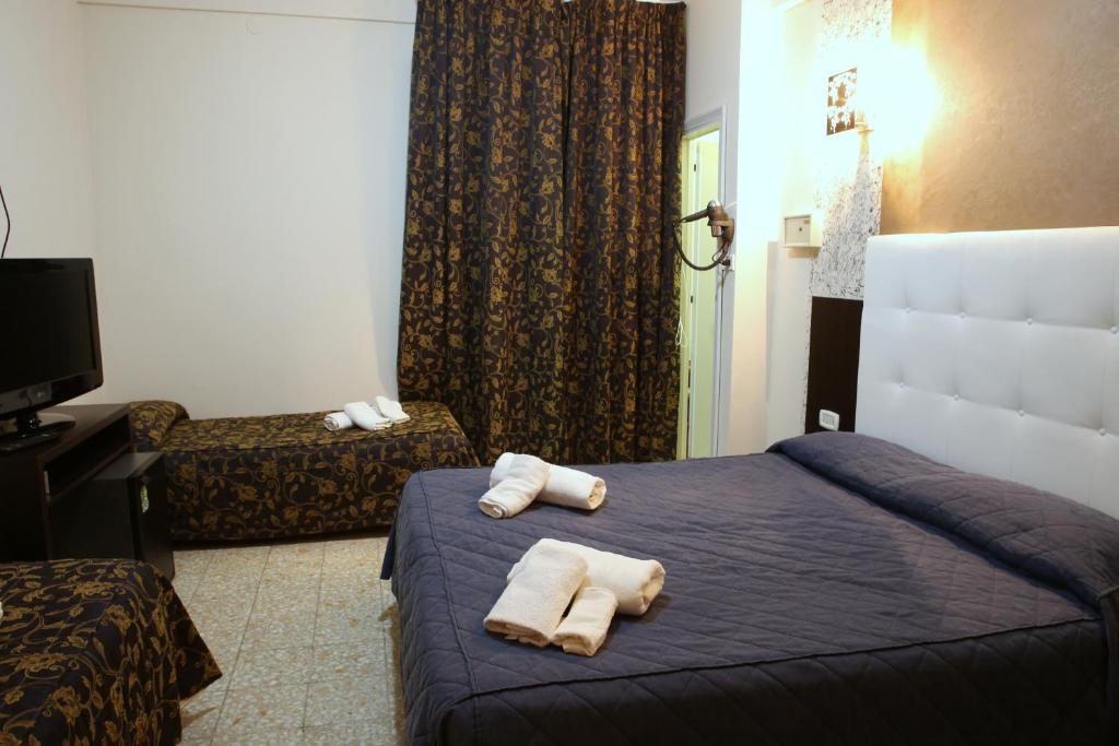 Трехместный (Трехместный номер) отеля Hotel Busignani, Римини