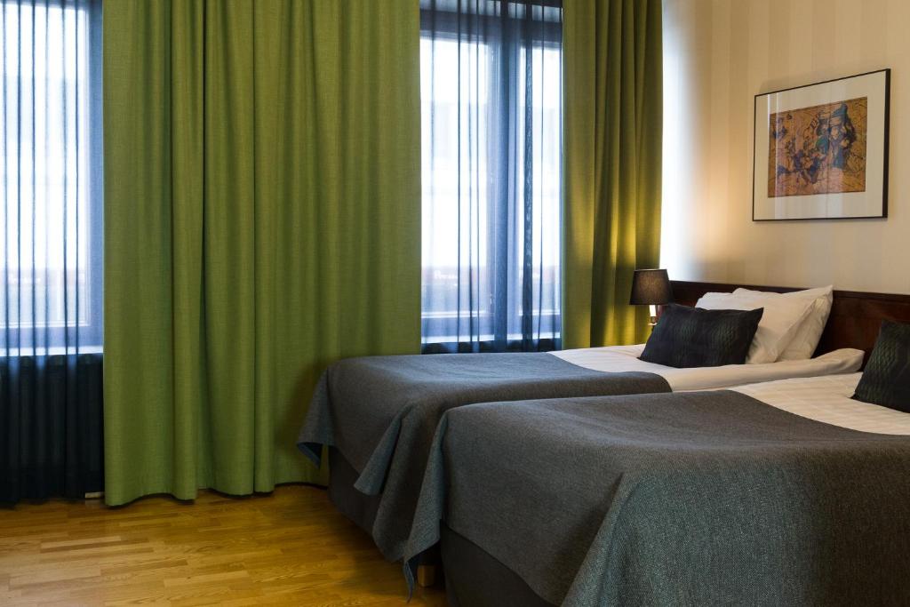 Двухместный (Улучшенный двухместный номер с 2 отдельными кроватями) отеля Hotel Verso, Ювяскюля