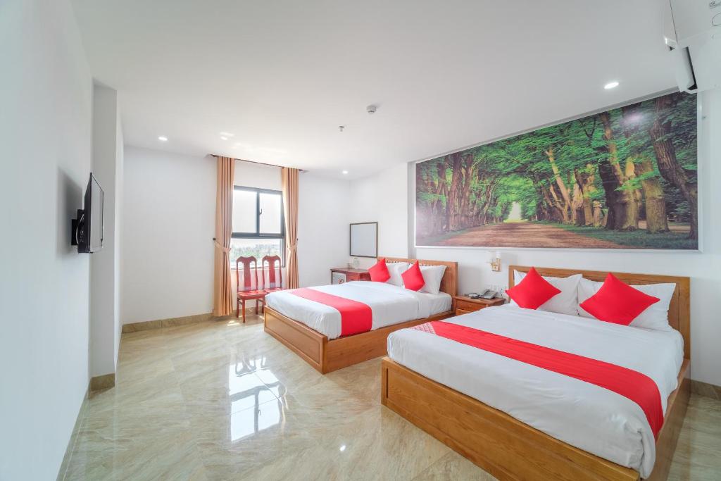 Двухместный (Двухместный номер Делюкс с 2 отдельными кроватями) отеля OYO 215 An Duc Hotel Da Nang, Дананг