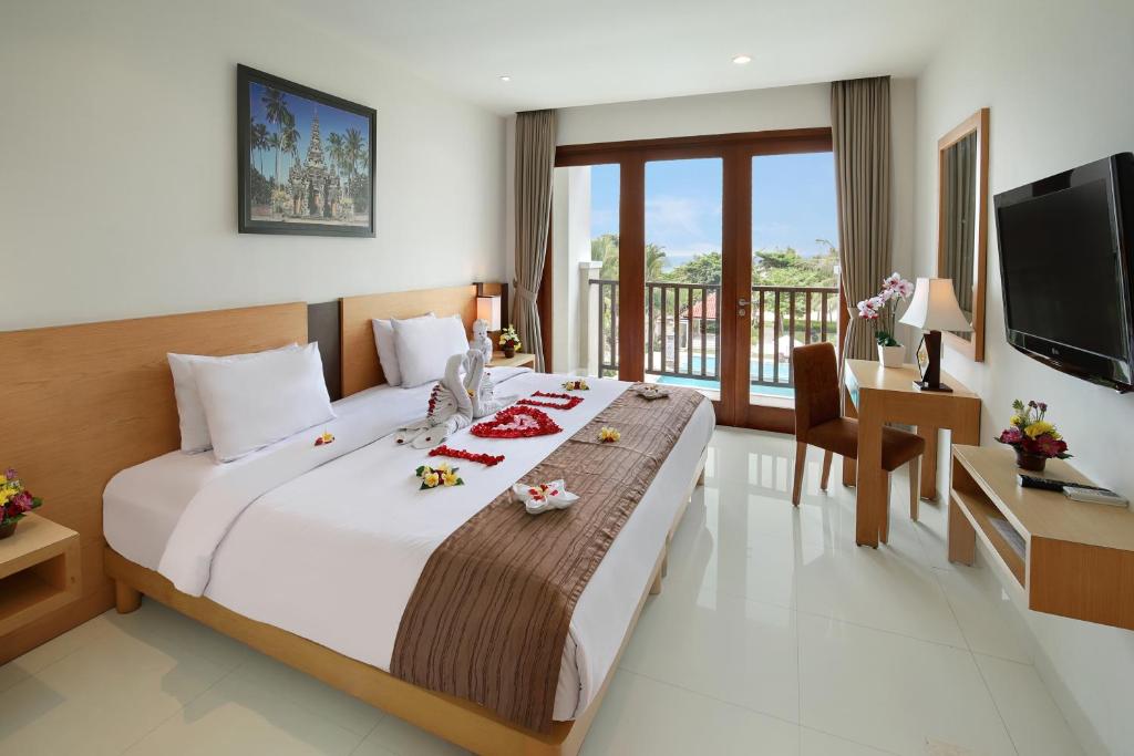 Двухместный (Горящее предложение при раннем бронировании - Номер Делюкс с видом на бассейн) курортного отеля Bali Relaxing Resort and Spa, Нуса Дуа