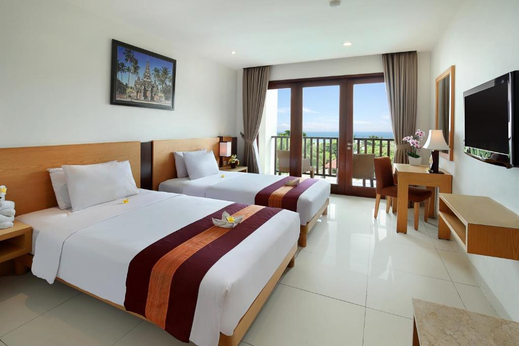 Двухместный (Номер Делюкс с видом на океан и бесплатными преимуществами) курортного отеля Bali Relaxing Resort and Spa, Нуса Дуа