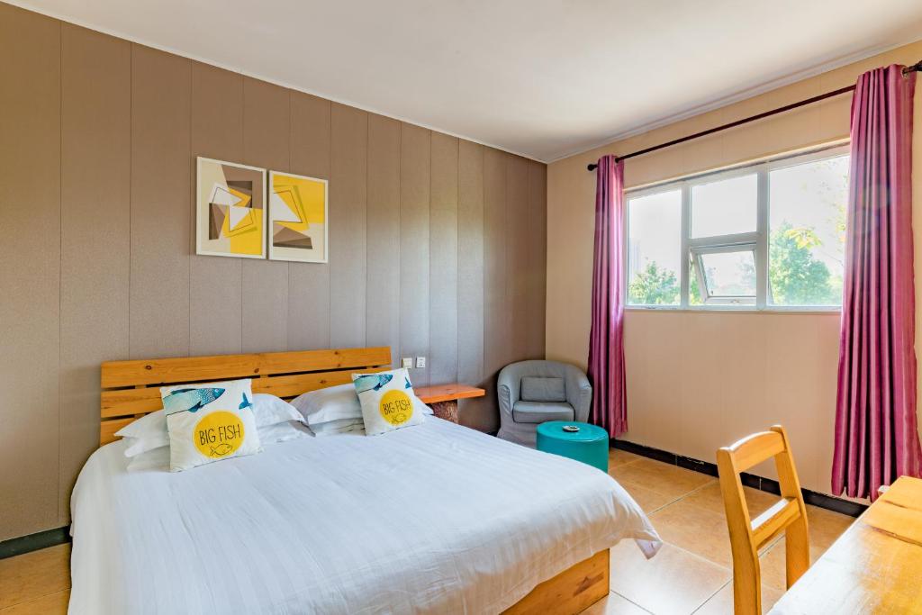 Двухместный (Двухместный номер Делюкс с 1 кроватью) хостела Chengdu Dreams Travel International Youth Hostel, Чэнду