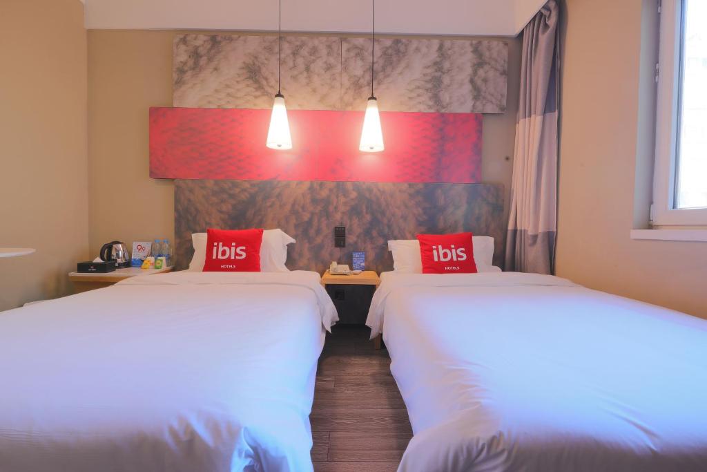 Двухместный (Двухместный номер с 2 отдельными кроватями) отеля Hotel Ibis Qingdao Ningxia, Циндао