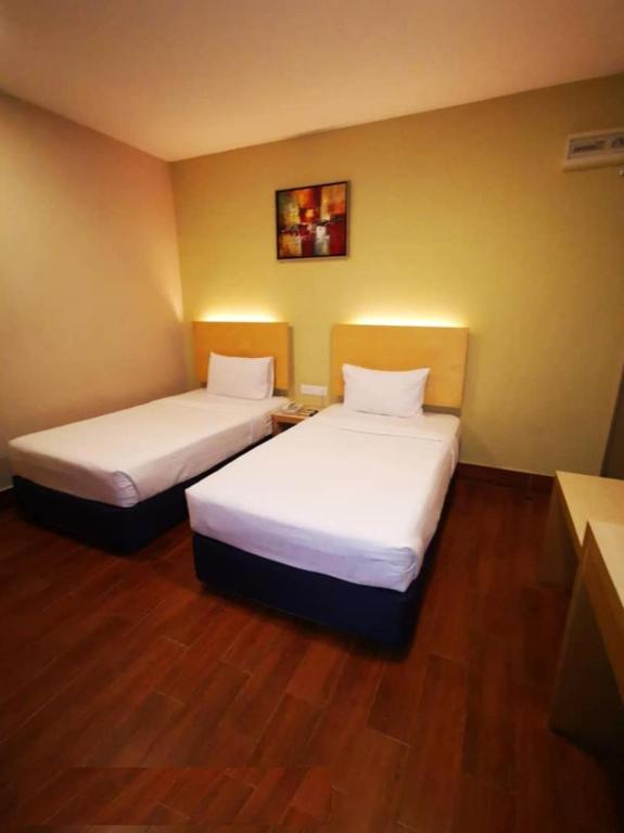 Двухместный (Улучшенный двухместный номер с 2 отдельными кроватями) отеля Metro Hotel @ KL Sentral, Куала-Лумпур
