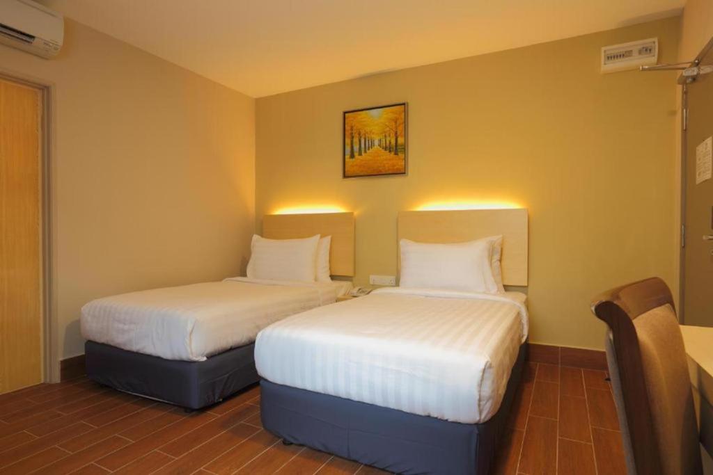 Двухместный (Стандартный двухместный номер с 2 отдельными кроватями) отеля Metro Hotel @ KL Sentral, Куала-Лумпур