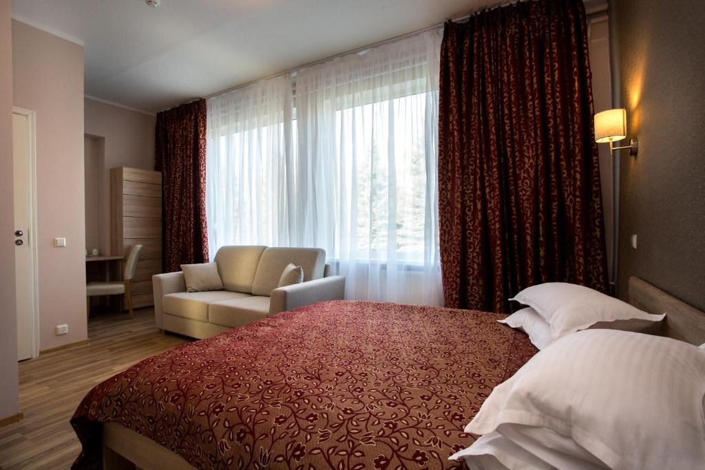 Двухместный (Улучшенный двухместный номер «Комфорт» с 1 кроватью и ванной) отеля Hotel Starest, Тарту