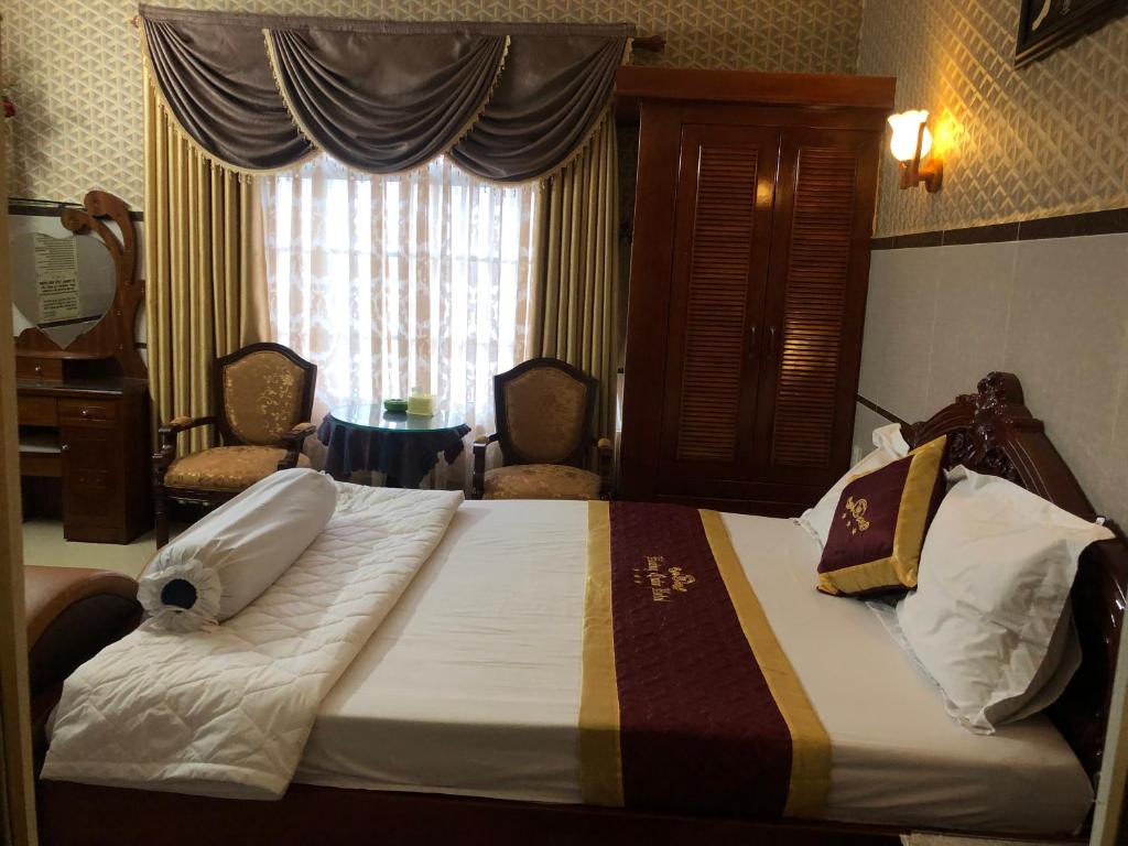 Двухместный (Номер Делюкс с кроватью размера «king-size»), Hoàng Quân Hotel