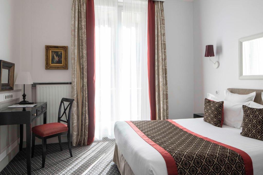 Двухместный (Улучшенный двухместный номер с 1 кроватью) отеля Bradford Elysées - Astotel, Париж