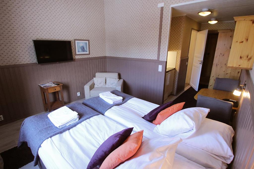Двухместный (Стандартный двухместный номер с 2 отдельными кроватями и сауной) отеля Hotel Hullu Poro, Леви
