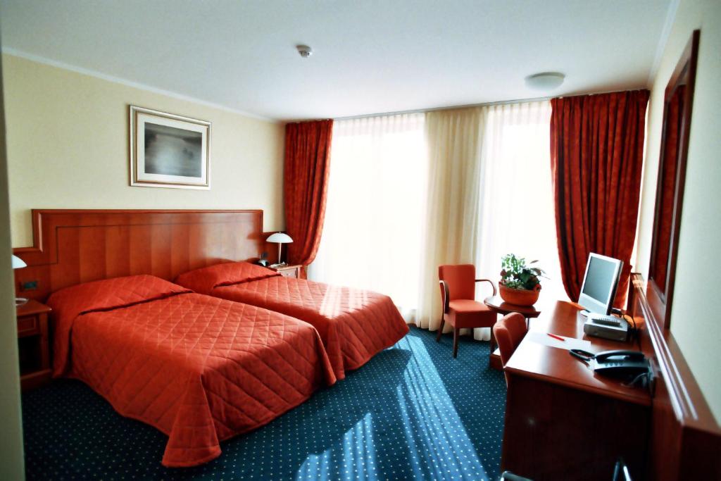 Двухместный (Двухместный номер с 1 кроватью или 2 отдельными кроватями) отеля Hotel Savus, Славонски-Брод