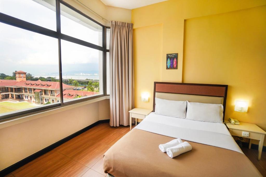 Двухместный (Улучшенный двухместный номер с 1 кроватью или 2 отдельными кроватями) отеля Lodge 18 Hotel, Пенанг