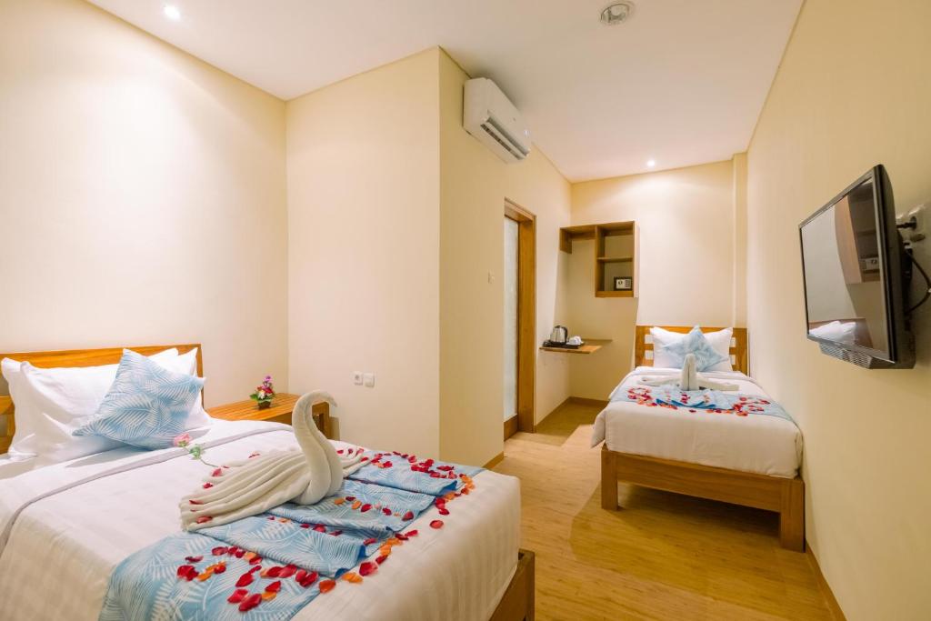 Двухместный (Стандартный двухместный номер с 2 отдельными кроватями) гостевого дома Caroline Guest House, Чангу