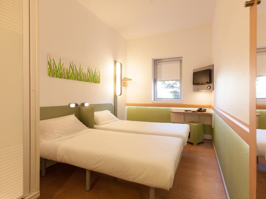 Двухместный (Двухместный номер с 2 отдельными кроватями) отеля Hotel ibis Budget Porto Gaia, Вила-Нова-ди-Гая