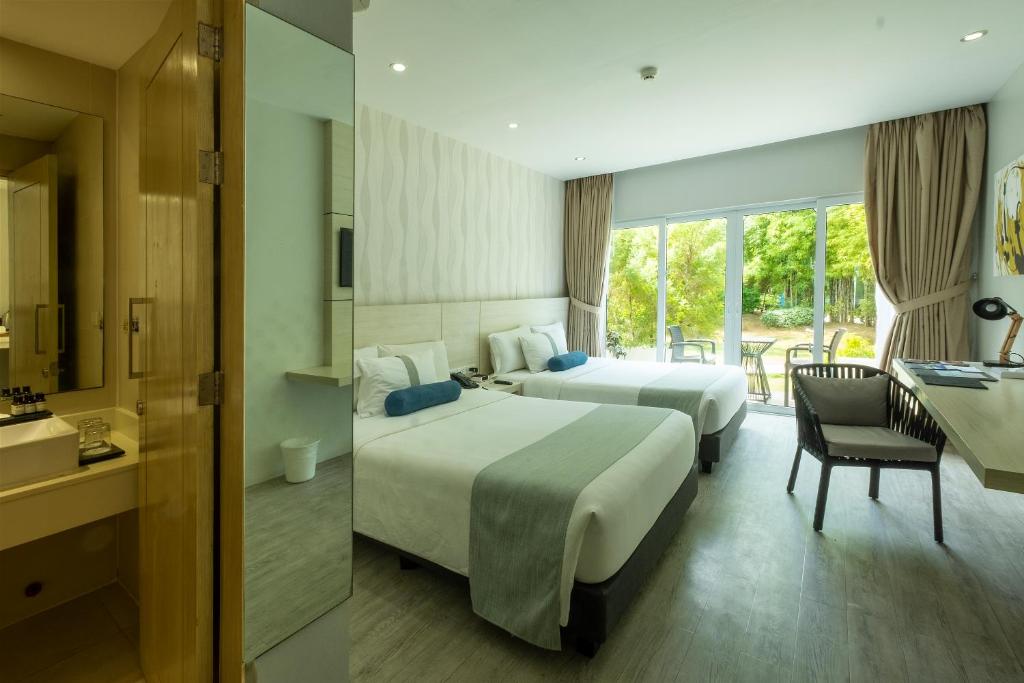 Двухместный (Premier Room with Garden View - Leisure) курортного отеля Solea Mactan Resort, Мактан