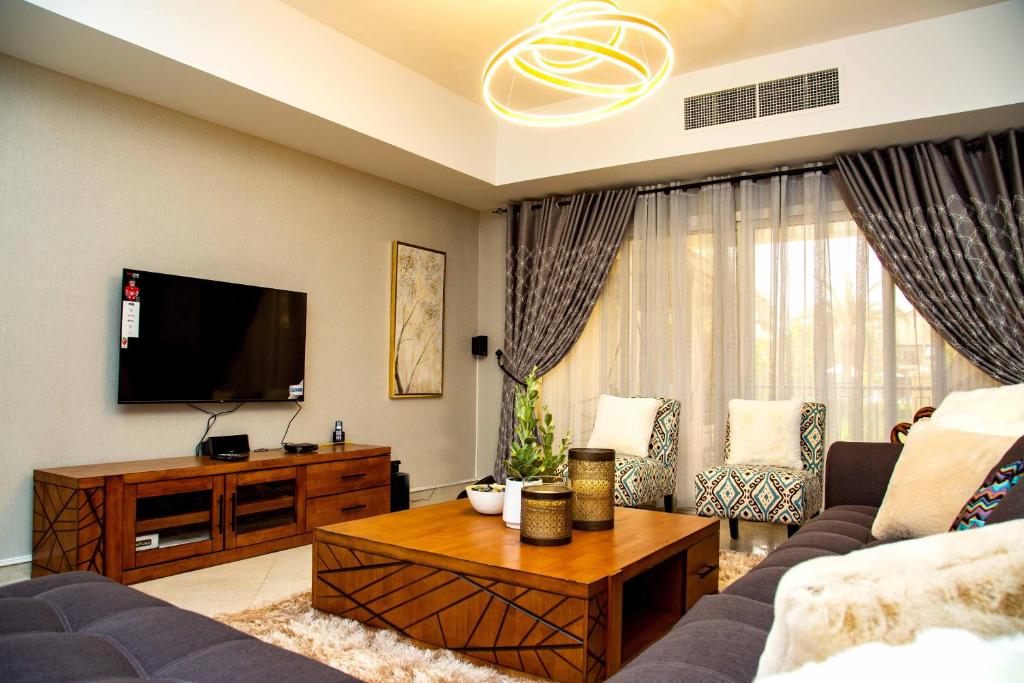 Апартаменты (Вилла с 4 спальнями и комнатой для горничной — Al Hamra Village) виллы Al Hamra Village Holiday Apartments, Рас-эль-Хайма