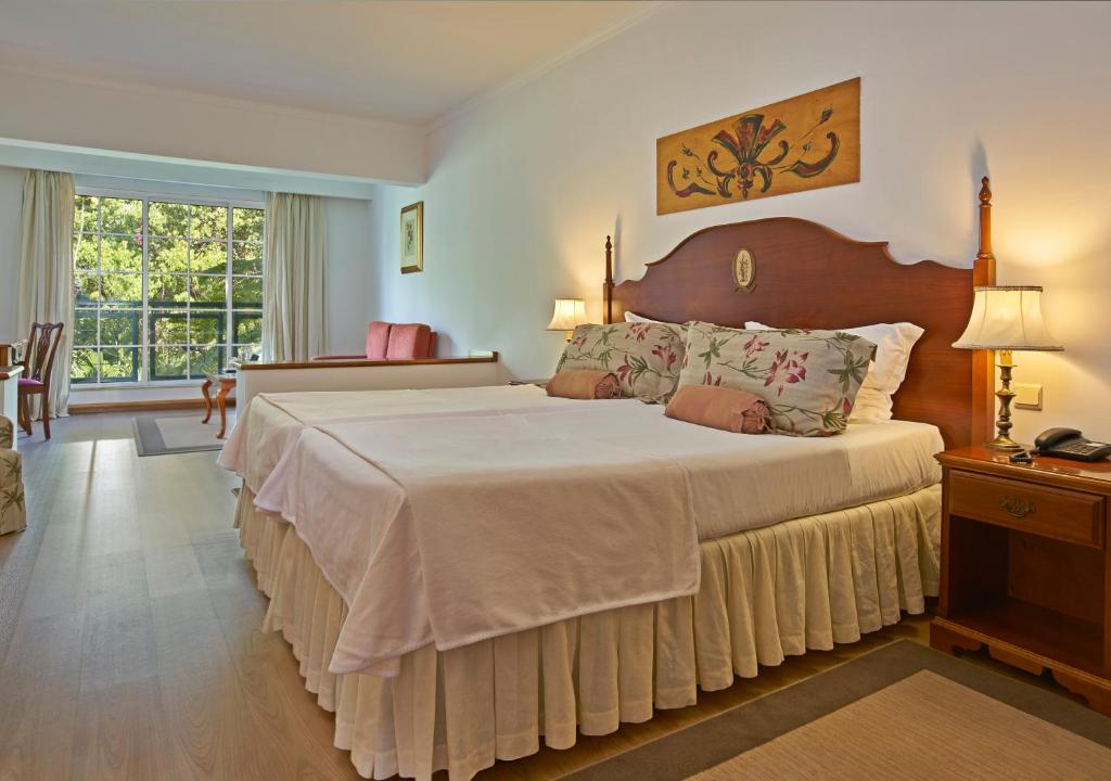 Двухместный (Двухместный номер Делюкс с 1 кроватью или 2 отдельными кроватями, вид на сад) отеля Quintinha Sao Joao, Фуншал