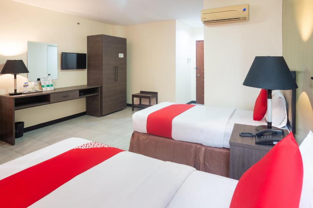 Двухместный (Двухместный номер Делюкс с 2 отдельными кроватями) отеля OYO 187 The Maxwell Hotel, Себу