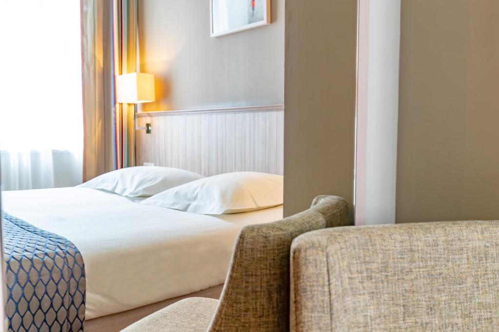 Двухместный (Двухместный номер с 1 кроватью или 2 отдельными кроватями и балконом, вид на море) отеля Antinéa, Сен-Мало