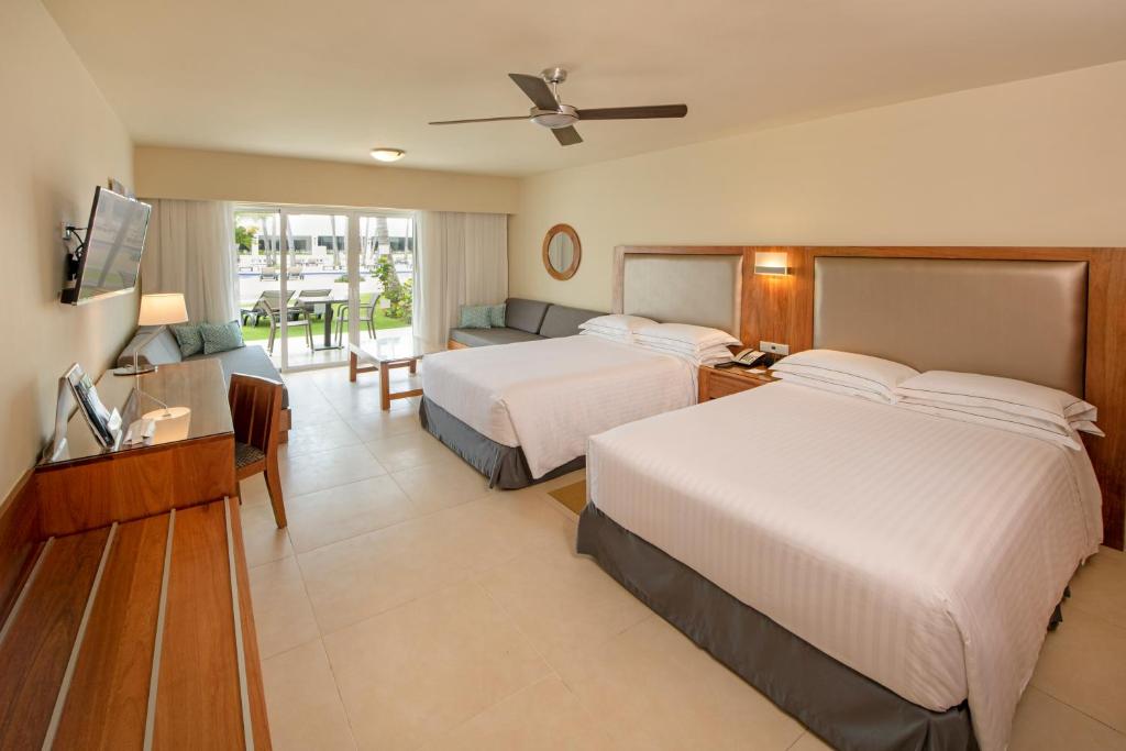 Двухместный (Улучшенный двухместный номер с 1 кроватью или 2 отдельными кроватями) курортного отеля Occidental Punta Cana, Пунта-Кана