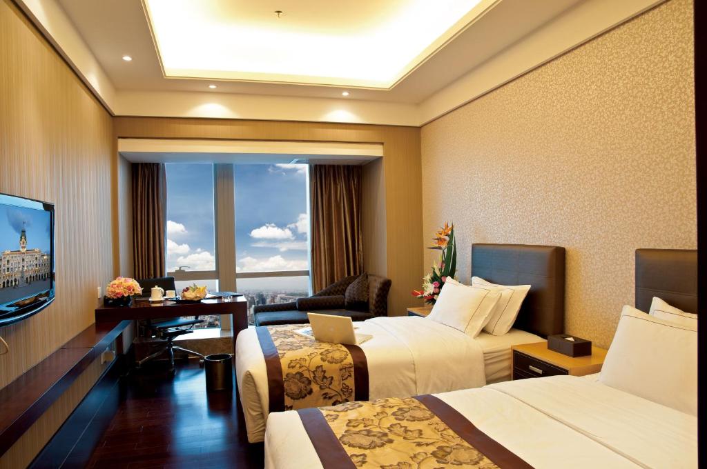 Двухместный (Улучшенный двухместный номер с 2 отдельными кроватями, завтрак для 1 гостя) отеля Vertical City Hotel Guangzhou, Гуанчжоу