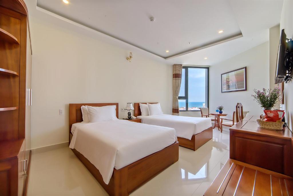 Двухместный (Улучшенный двухместный номер с 2 отдельными кроватями и видом на море) отеля Phuoc My An Beach Hotel, Дананг