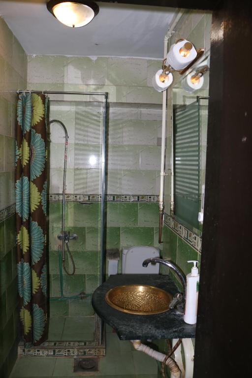 Четырехместный (Четырехместный номер с общей ванной комнатой) хостела Wake Up! Cairo Hostel, Каир