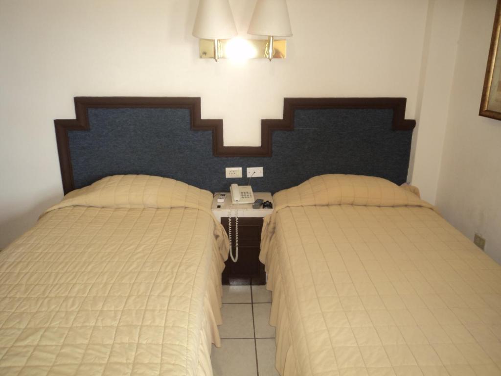 Двухместный (Двухместный номер с 2 отдельными кроватями) отеля Hotel Hacienda Nainari, Сьюдад-Обрегон