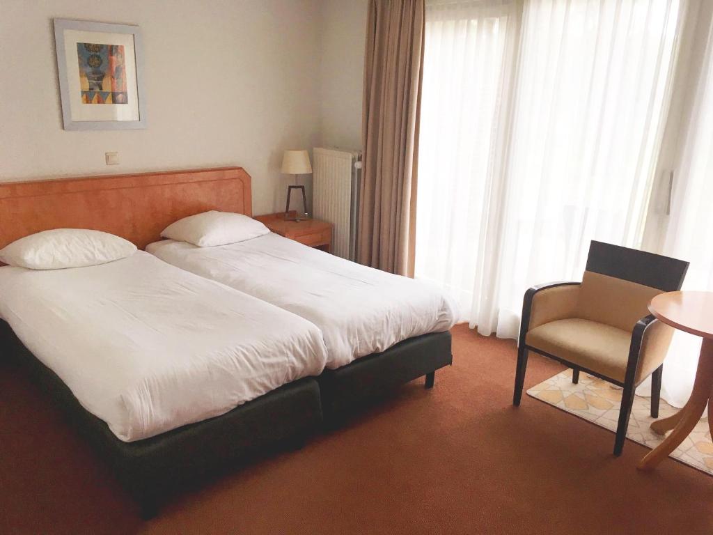 Двухместный (Двухместный номер с 1 кроватью и патио) отеля Fletcher Hotel Restaurant Victoria-Hoenderloo, Арнем